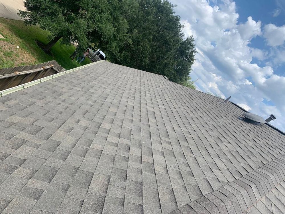 Slide of Reborn Roofing & Construction