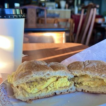 Serra Doce Daytona - Egg & American cheese on their Portuguese Bread. 16oz Dirty Chai Latte - Breakfast & Brunch Near Me - Daytona Beach, Florida Serra Doce Daytona - Egg & American cheese on their Portuguese Bread. 16oz Dirty Chai Latte - Breakfast & Brunch Near Me - Daytona Beach, Florida
