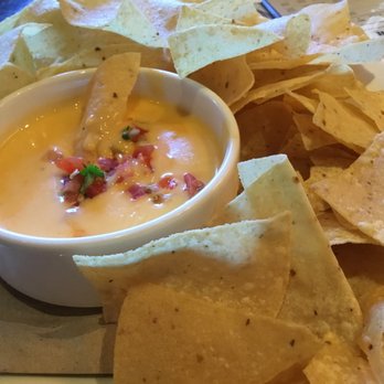 BJ's Restaurant & Brewhouse - Chips and queso - New American Near Me - Hurst, Texas BJ's Restaurant & Brewhouse - Chips and queso - New American Near Me - Hurst, Texas