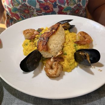 Claytons Siesta Grille - Paella with risotto and halibut. - New American Near Me - Sarasota, Florida