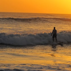 Tom wrapping up a great day in the surf in Nica.