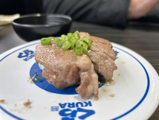 Kura Revolving Sushi Bar by null