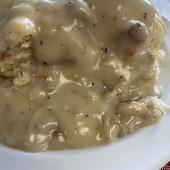 JoJo's Country Cafe - 1/2 order of biscuits and gravy. Biscuits were nice and fluffy and the gravy had nice flavor. - American Near Me - Deltona, Florida