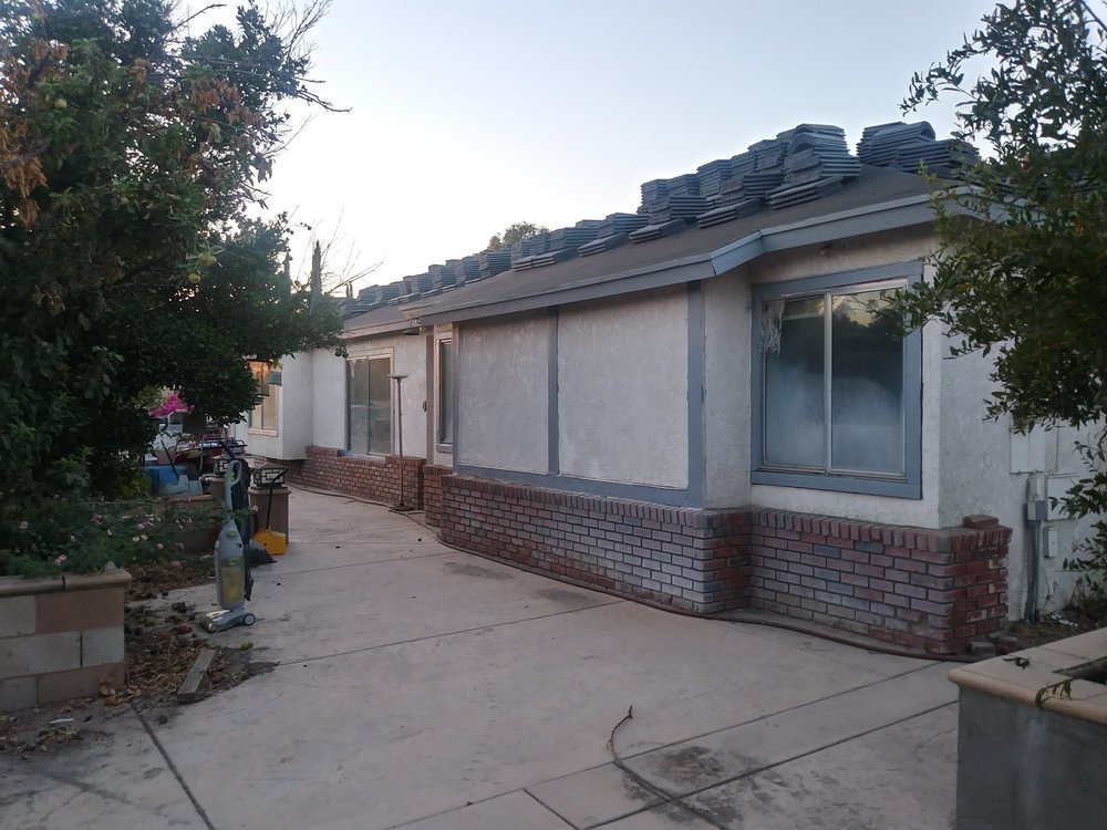 Slide of Ortiz Roofing and Construction Company