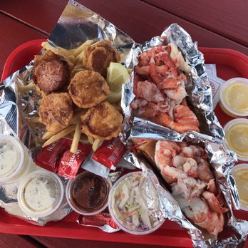 Red's Eats - Scallop basket (includes large fry & coleslaw, $14.50) and two monster lobster rolls ($22 today). Ample butter & sauces - Seafood Near Me - Wiscasset, Maine Red's Eats - Scallop basket (includes large fry & coleslaw, $14.50) and two monster lobster rolls ($22 today). Ample butter & sauces - Seafood Near Me - Wiscasset, Maine
