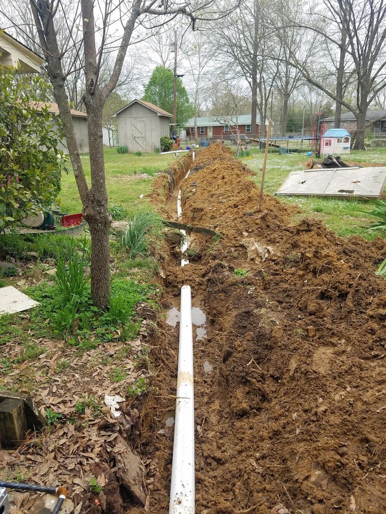 Slide of Rock's Plumbing and Drain Services