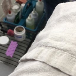 See the remover he was using...dipped brush in that.