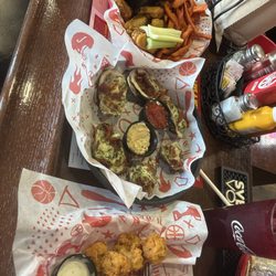 Jeffersons - Fried mushrooms, baked oysters with spinach and artichoke, lemon pepper chicken
