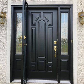 Benoit Home Improvements - a black front door with two sidelights - Windows Installation Near Me - Wilmington, Delaware Benoit Home Improvements - a black front door with two sidelights - Windows Installation Near Me - Wilmington, Delaware