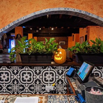 Casa Tequila - a bar counter with a laptop on it - Mexican Near Me - Salem, Massachusetts