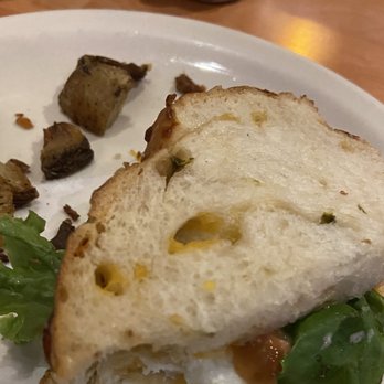 Arturo's Underground Cafe - Egg sandwich on jalapeño cheese bread, and house potatoes, those are extra. - Cafes Near Me - Austin, Texas