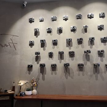 Frame - love the camera wall - Coffee & Tea Near Me - New York, New York