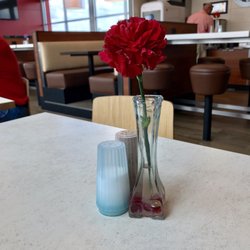Nice flower on each table