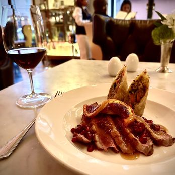 Criollo Restaurant - Duck with pomegranate, blood orange and vegetable Egg-rolls - New American Near Me - New Orleans, Louisiana Criollo Restaurant - Duck with pomegranate, blood orange and vegetable Egg-rolls - New American Near Me - New Orleans, Louisiana