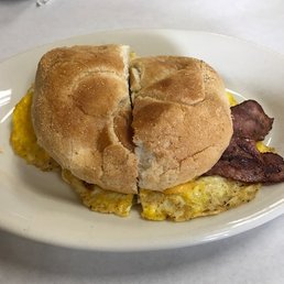 Turkey bacon egg and cheese breakfast sandwich on a kaiser roll Turkey bacon egg and cheese breakfast sandwich on a kaiser roll