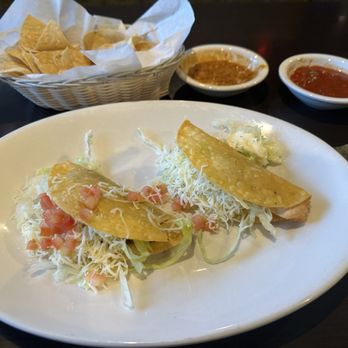 Javi's Fine Mexican Food Restaurant - Two crispy tacos (1 beef, 1 chicken). Chips, salsa, refried beans, too! - Mexican Near Me - Patterson, California