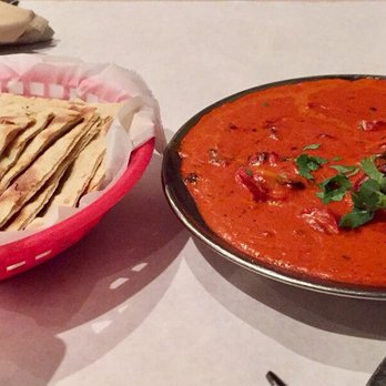 India's Restaurant - The butter chicken entree and roti naan. - Indian Near Me - Baton Rouge, Louisiana India's Restaurant - The butter chicken entree and roti naan. - Indian Near Me - Baton Rouge, Louisiana