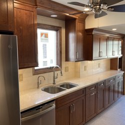 Dream Builders & Remodeling - Cherry kitchen with subway backsplash