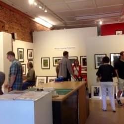 Through This Lens Inc - Gallery during the Durham Art Walk Spring Market.