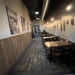 Tono Pizzeria + Cheesesteaks - Inside seating. Not much but better than nothing