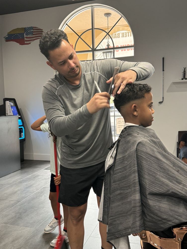 The Jupiter Barbershop Logo