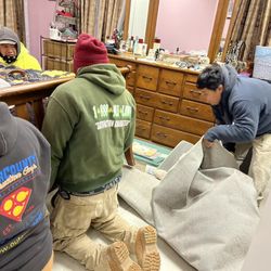 Outer County Construction - Lifting a carpet