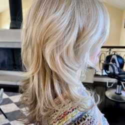 Gallery Salon & Spa - Fun blonde highlight and cut, lots of layers.