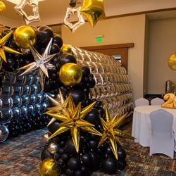 Funtime Services - entrance balloon tunnel with foil square balloons