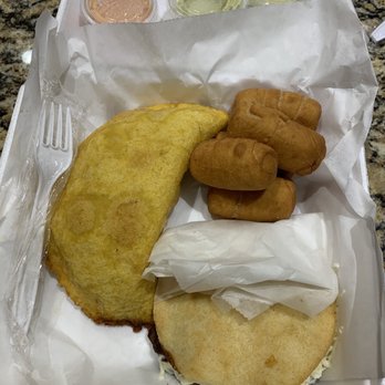 El Arepaso Venezuelan Cafe - Fork for size reference. Left is pabellon empanada, going clockwise are tequeños (filled with cheese), bottom is bean and cheese arepa. - Venezuelan Near Me - Tulsa, Oklahoma El Arepaso Venezuelan Cafe - Fork for size reference. Left is pabellon empanada, going clockwise are tequeños (filled with cheese), bottom is bean and cheese arepa. - Venezuelan Near Me - Tulsa, Oklahoma