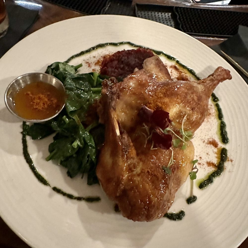 Roasted half duck with orange gastrique. Roasted half duck with orange gastrique.