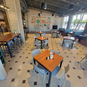 Central Market - Cafe On The Run customer dining area (open seating, first-come first-serve) has new tables, and a music stage. - Grocery Near Me - Plano, Texas Central Market - Cafe On The Run customer dining area (open seating, first-come first-serve) has new tables, and a music stage. - Grocery Near Me - Plano, Texas
