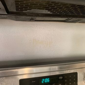 Royalty Cleaning Service - She use wrong chemical that faded the paint behind the stove - Home Cleaning Near Me Royalty Cleaning Service - She use wrong chemical that faded the paint behind the stove - Home Cleaning Near Me