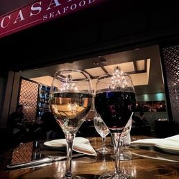 Front of restaurant with wine to start off dinner. Front of restaurant with wine to start off dinner.