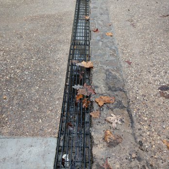American Standard Foundation Repair - a drain in the sidewalk - General Contractors Near Me American Standard Foundation Repair - a drain in the sidewalk - General Contractors Near Me
