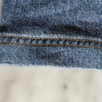 Denim Doctors - Matched the original wide hem and aging at the hem and along the bottom of the jeans. Tricky hem, but they matched the original exactly! - Sewing & Alterations Near Me - Los Angeles, California Denim Doctors - Matched the original wide hem and aging at the hem and along the bottom of the jeans. Tricky hem, but they matched the original exactly! - Sewing & Alterations Near Me - Los Angeles, California