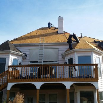 Pro Star Restoration - two men on a roof - Roofing Near Me - Alpharetta, Georgia Pro Star Restoration - two men on a roof - Roofing Near Me - Alpharetta, Georgia