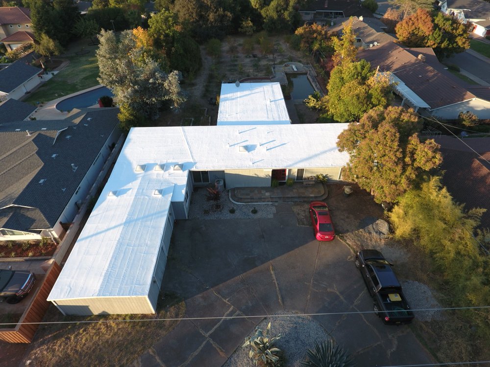 Slide of Flat Roofing Pros