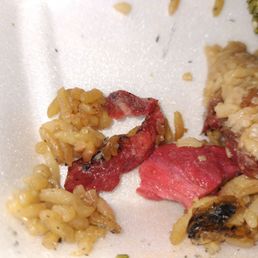 You can see the Cockroach was cooked just chilling in the rice