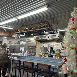 North Pole Store - Cute Christmas decor and VERY clean kitchen in the background!