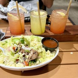 Condado Tacos - House Margarita Kit - flight strawberry and pineapple.  Build Your Own Packed Bowl - not so packed.