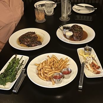 The Cutlery - Ribeye, Paniolo style Prime rib, lobster tail, duck fat fries & charred broccolini. - Steakhouses Near Me - Honolulu, Hawaii