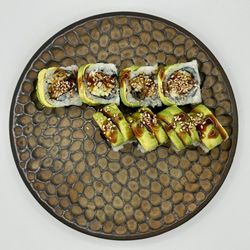 Dragon: Eel, cucumber topped w. avocado and tobiko