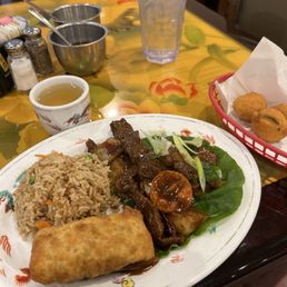 Mongolian beef lunch plate with hush puppies