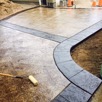 Best In Concrete Services - Applying the sealant - Masonry/Concrete Near Me