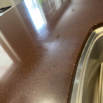 Integrity Marble - Damage next to sink - Flooring Near Me