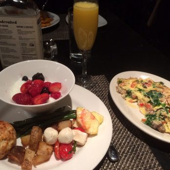 J Gilbert's - Mimosa with vegetarian brunch food - Steakhouses Near Me - McLean, Virginia