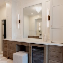 Luxury primary bathroom remodel with a dry sauna, zero-entry shower, heated floors, and timeless custom finishes.