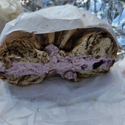 Cinnamon Raisin bagel with blueberry cream cheese.