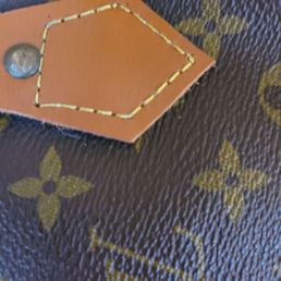 Uneven stitching, noticeable holes where stitching was redone. Uneven stitching, noticeable holes where stitching was redone.