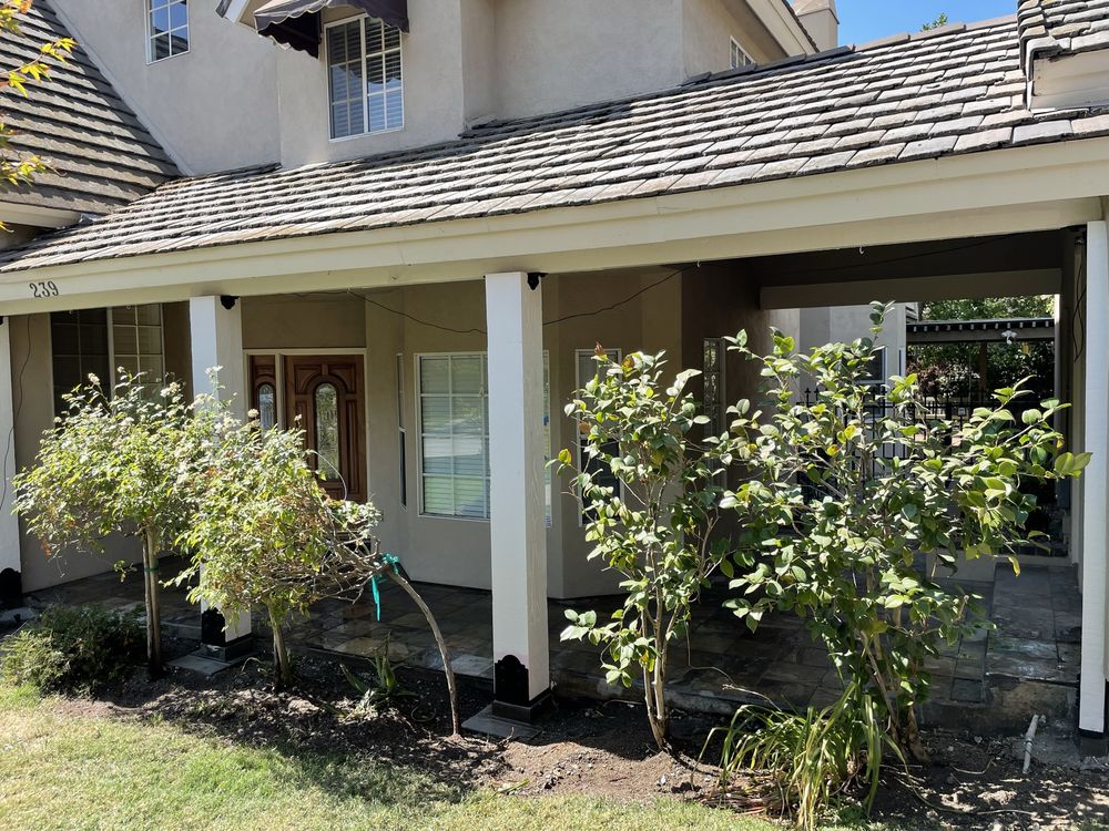 Slide of The Local Friendly Roofer
